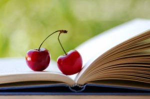 Открытая книга и вишни