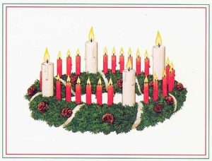 Рождественский венок с красными и белыми свечами