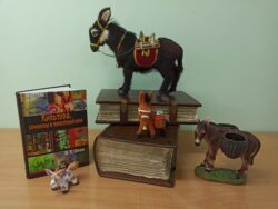 Фото - осел на книгах